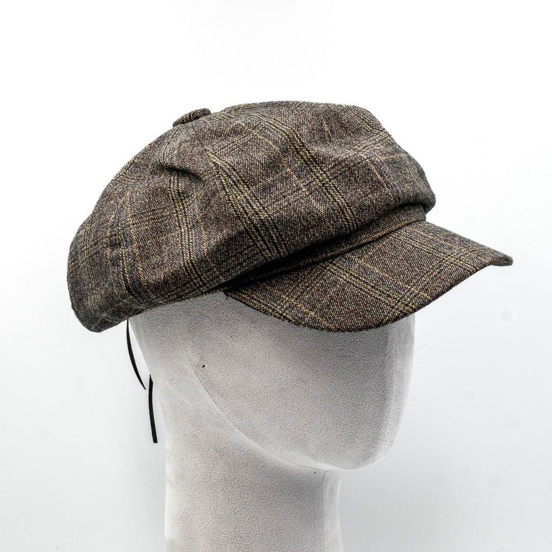 Cappello con visiera scozzese
