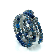 Bracciale a molla con pietre e cristalli