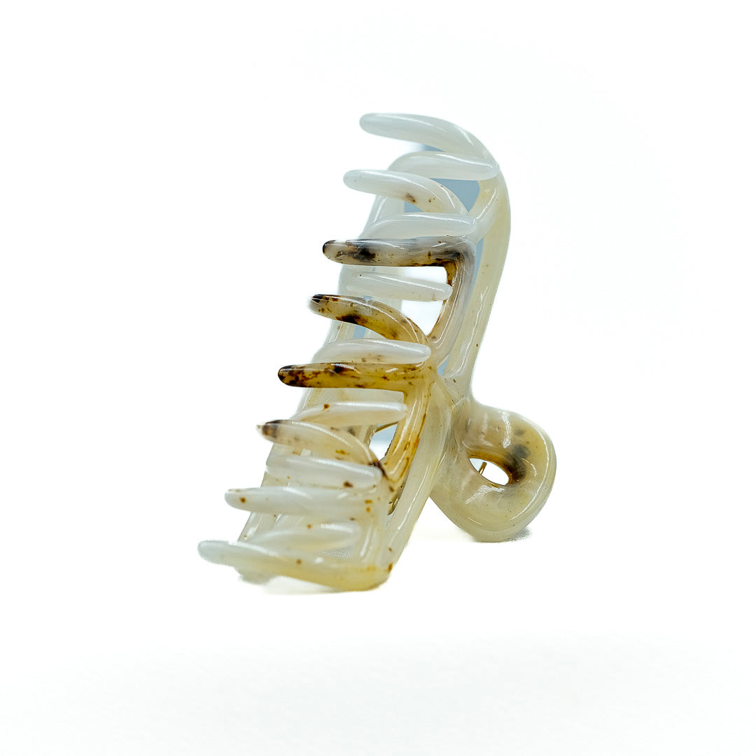 Pinza per capelli a iniezione