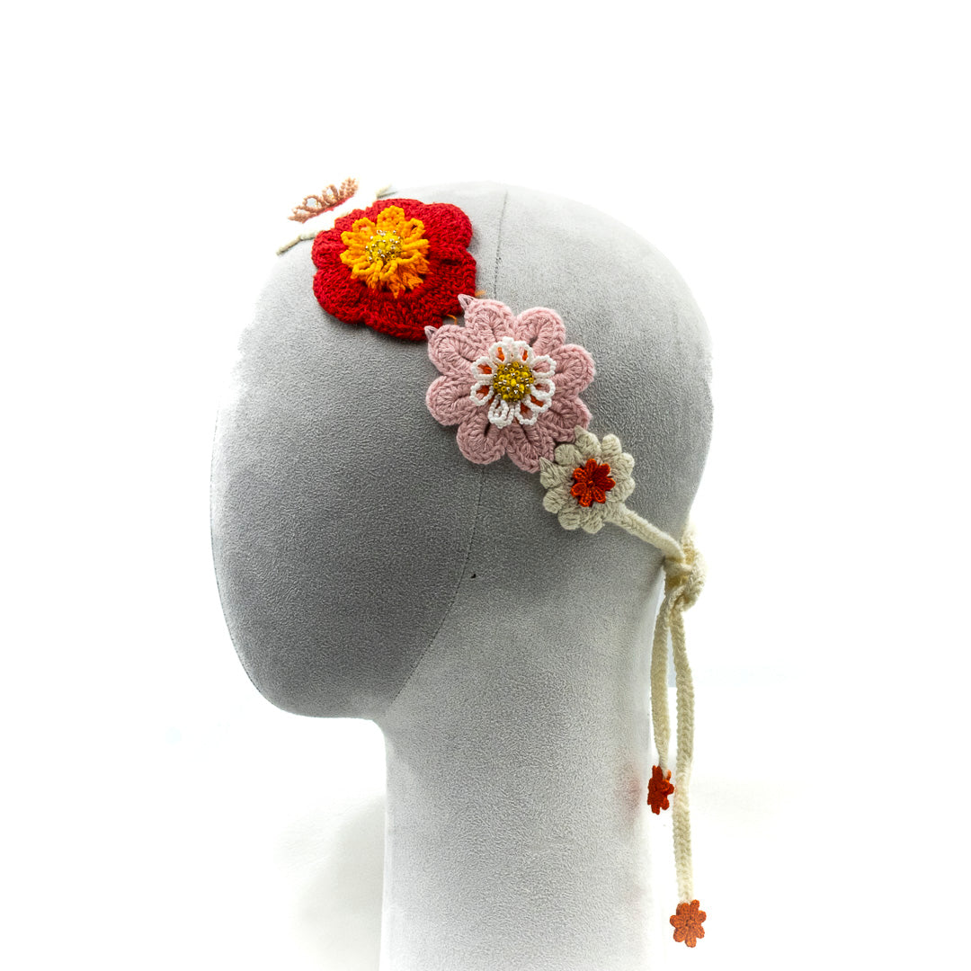 Fascia con fiori a crochet