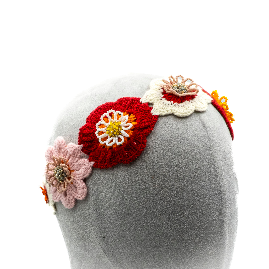 Fascia con fiori a crochet